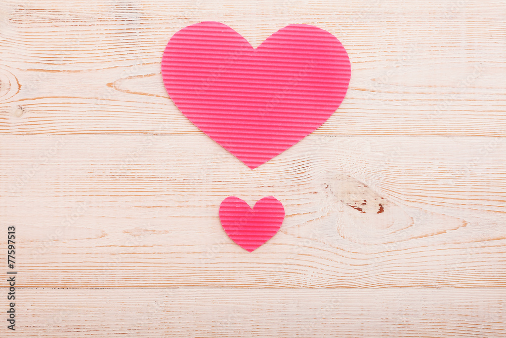 Hearts from paper. Valentines day. Wooden background Hearts from paper. Valentines day. Wooden background