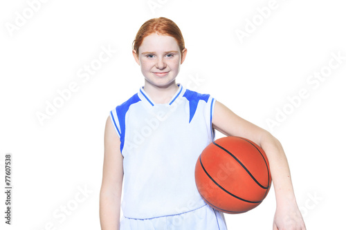 A teenager basketball player over a white background