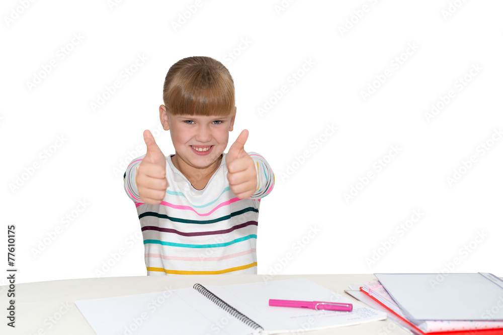 Smiling girl showing thumbs up isolated Smiling girl showing thumbs up isolated
