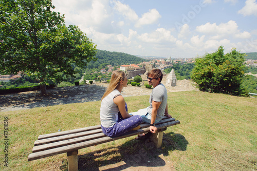 Couple in Sunglasses on Bench