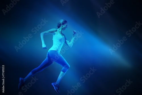 Fototapeta Naklejka Na Ścianę i Meble -  Composite image of pretty fit blonde jogging