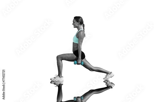 Composite image of fit woman doing weighted lunges on the beach