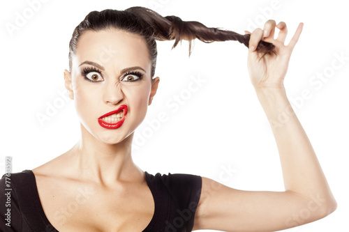 young woman making a funny face photo
