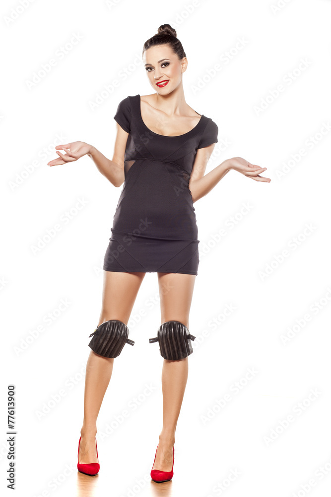 pretty woman with high heels, and with knee protectors pretty woman with high heels, and with knee protectors