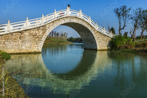 ancient Chinese architecture,blue sky,bridge © hxdyl