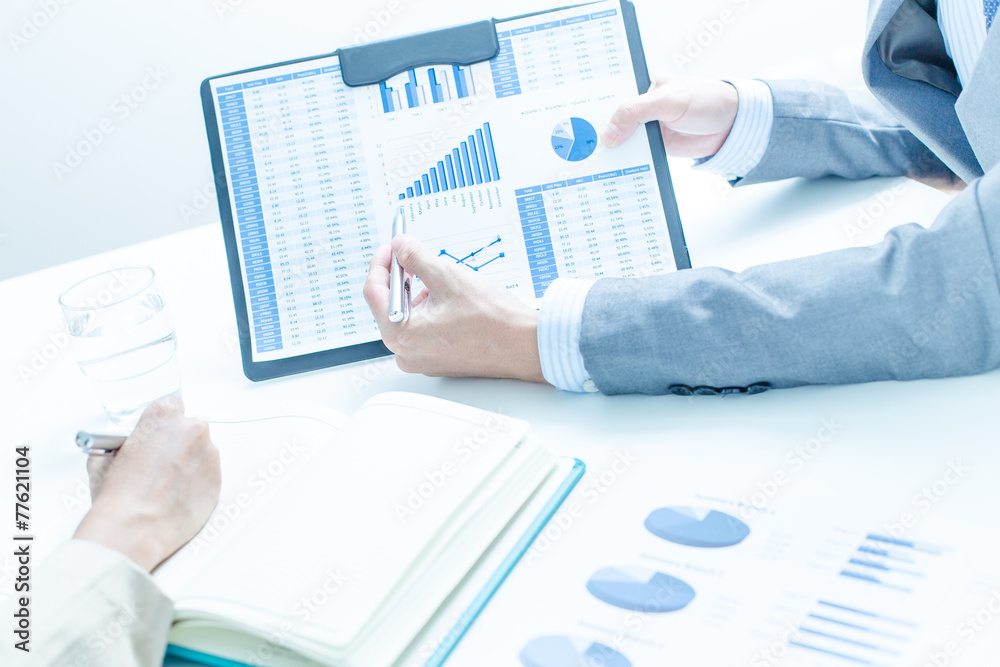 Business people discussing the charts and graphs showing the res