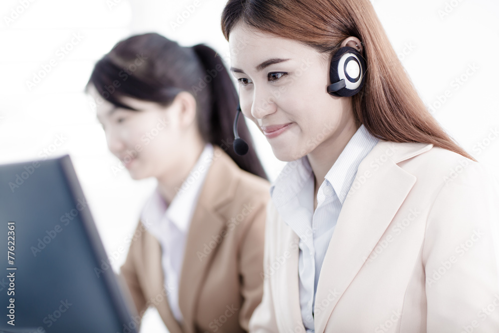 Asian women call center with phone headset Asian women call center with phone headset