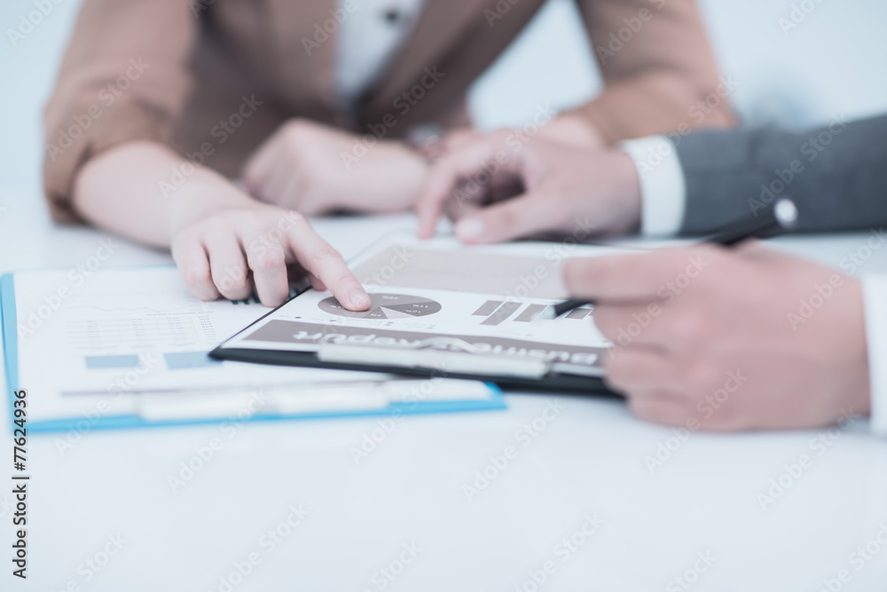 Business people discussing during a meeting Business people discussing during a meeting
