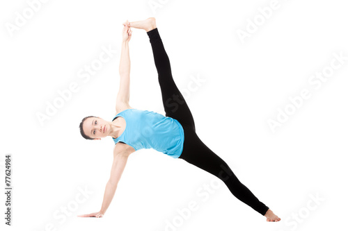 Yogi female in yoga asana Vasisthasana