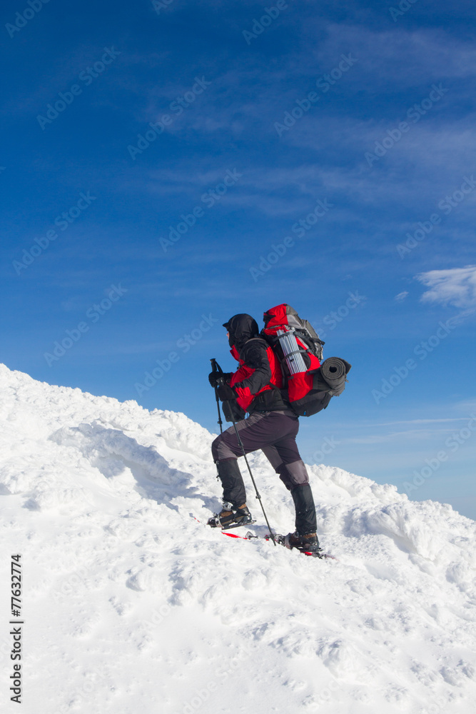 Winter hiking in snowshoes.