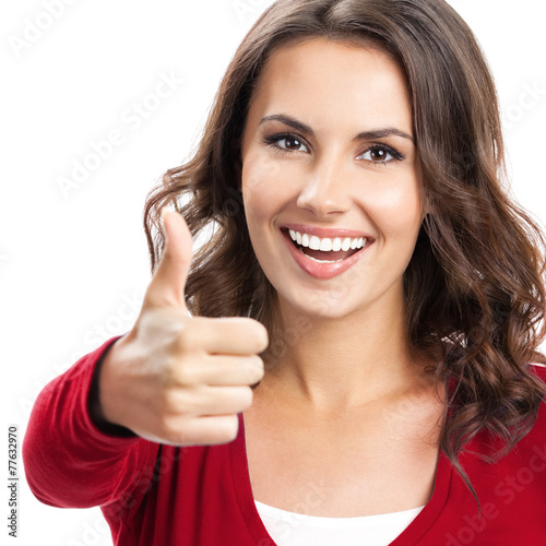 Woman showing thumbs up gesture, over white