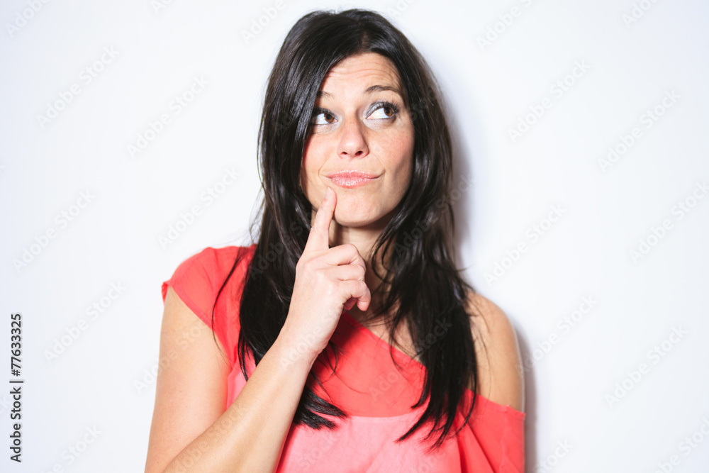 Smiling black hair woman on grey background Smiling black hair woman on grey background