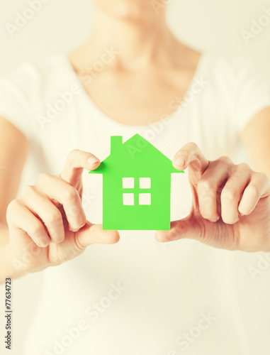 woman hands holding green house