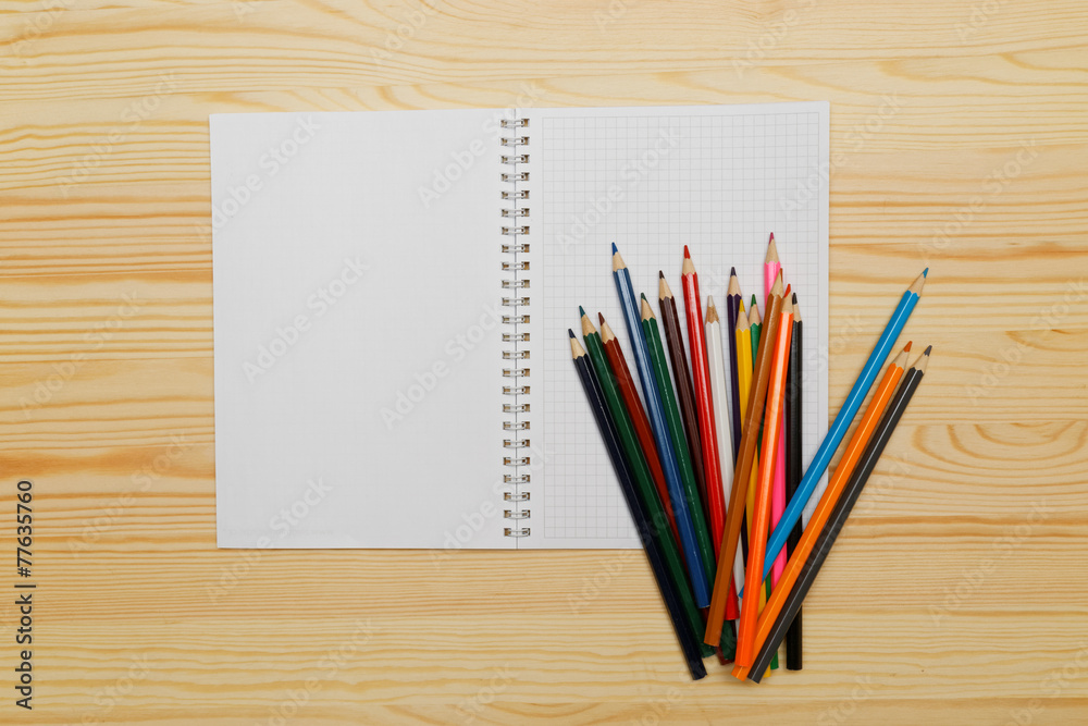 Color pencils on wood background Color pencils on wood background
