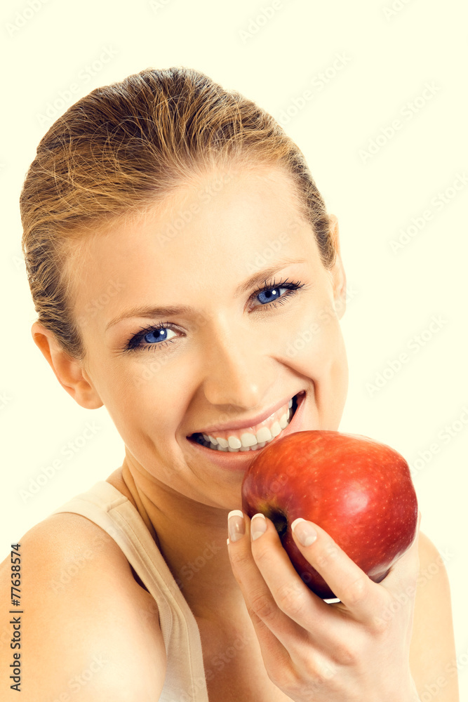 Portrait of young woman eating red apple Portrait of young woman eating red apple