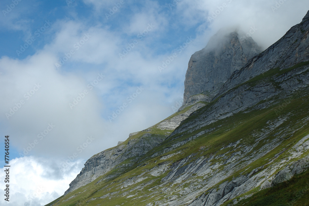 Peak in clouds nearby Grindelwald in Switzerland