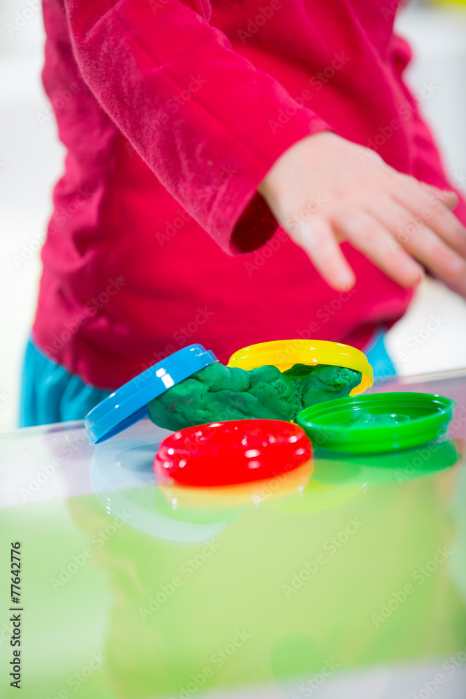 Child play with plasticine Child play with plasticine