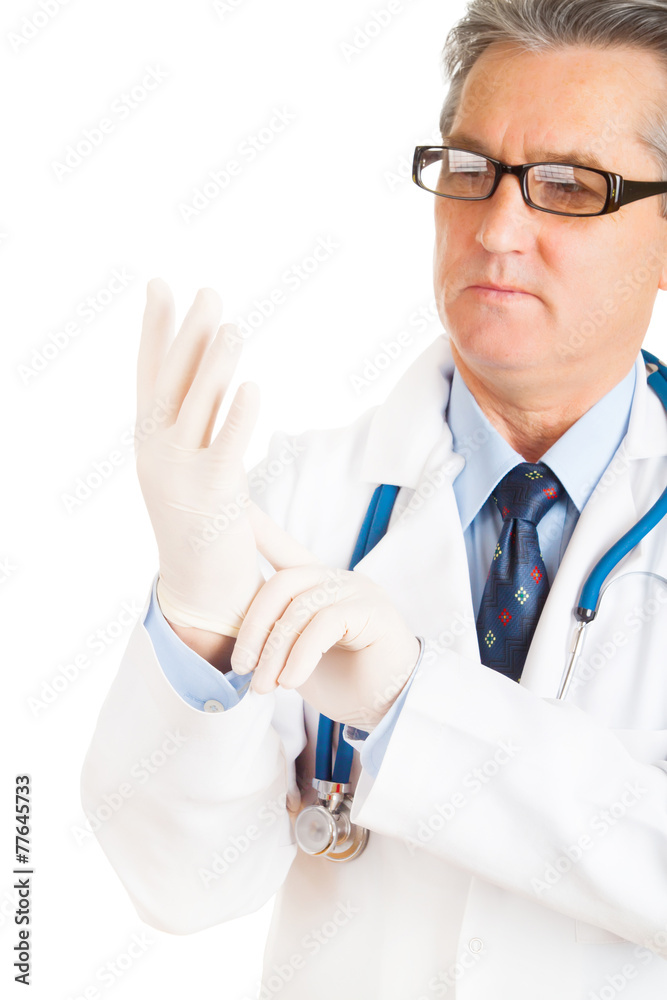Male doctor putting on protective gloves on white background Male doctor putting on protective gloves on white background