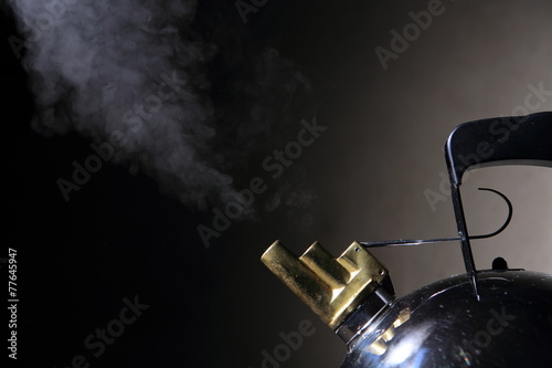 steaming tea kettle photo