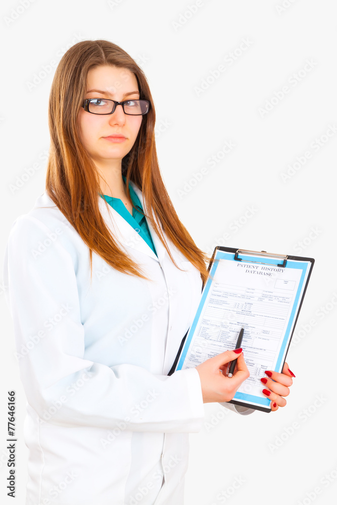 Portrait of a beautiful young female doctor writing a prescripti Portrait of a beautiful young female doctor writing a prescripti
