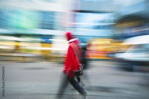 Blurred pedestrian, zoom effect © FotoKachna