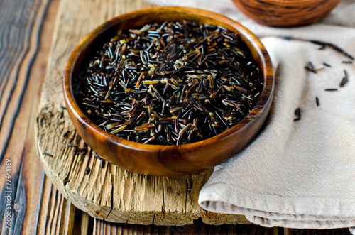 Boiled wild rice in a wooden bowl
