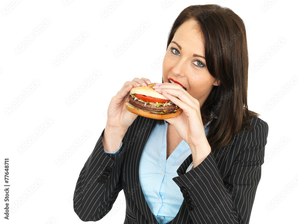 Young Business Woman Eating a Beef Burger