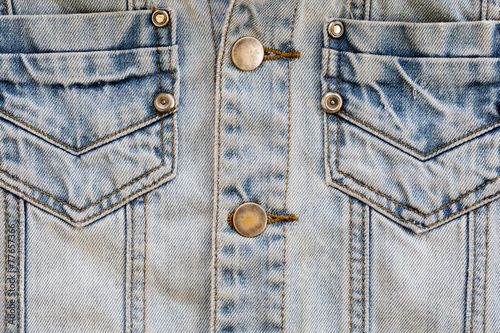 jean shirt with pocket and metal button on clothing