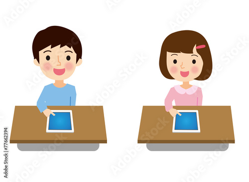 タブレット端末を使って勉強する小学生