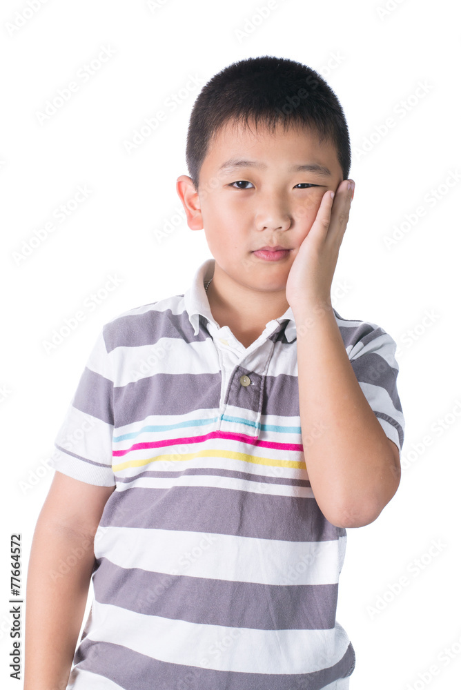 Boy having a toothache holding his face with his hand, isolated Boy having a toothache holding his face with his hand, isolated