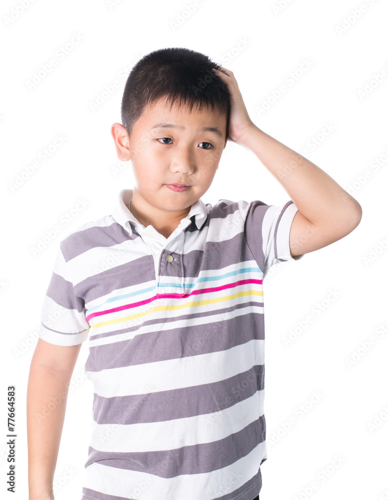 Boy having a headache holding his head with his hand, isolated Boy having a headache holding his head with his hand, isolated