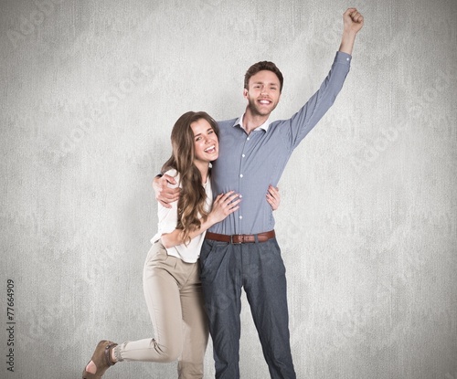 Composite image of portrait of cheerful young couple