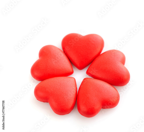 Decorative red hearts isolated on white
