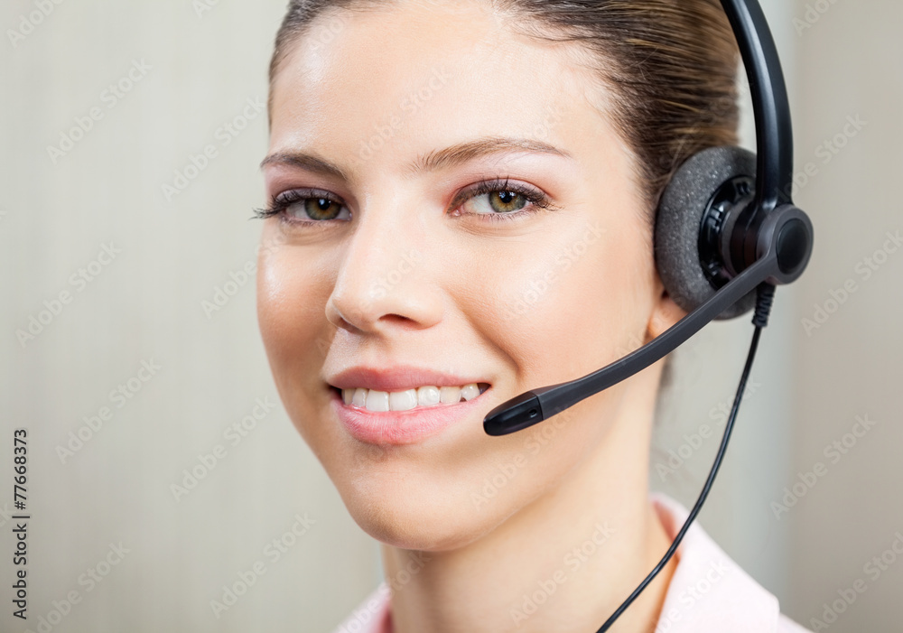 Closeup Of Customer Service Agent Wearing Headset Closeup Of Customer Service Agent Wearing Headset