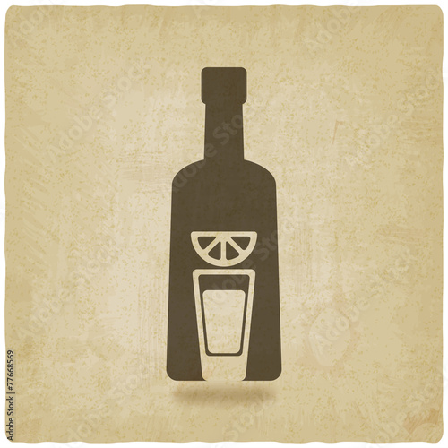 tequila bottle old background