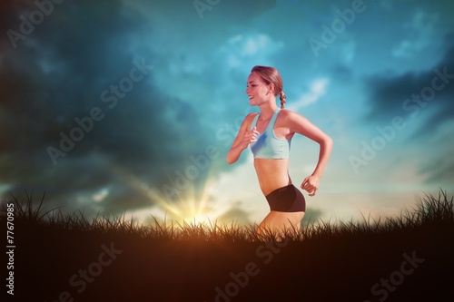 Composite image of fit woman jogging