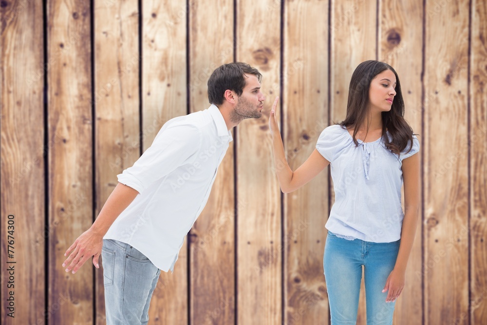 Composite image of brunette uninterested in mans advances