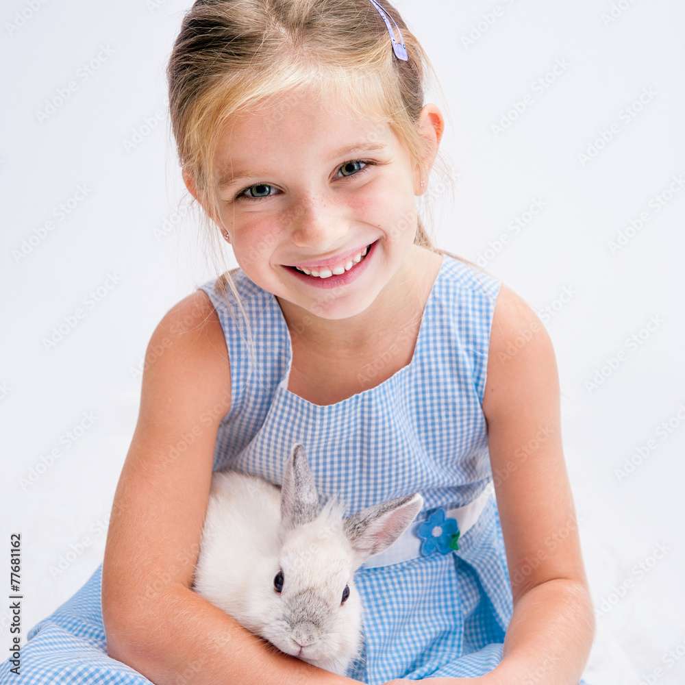 cute little girl a white rabbit cute little girl a white rabbit