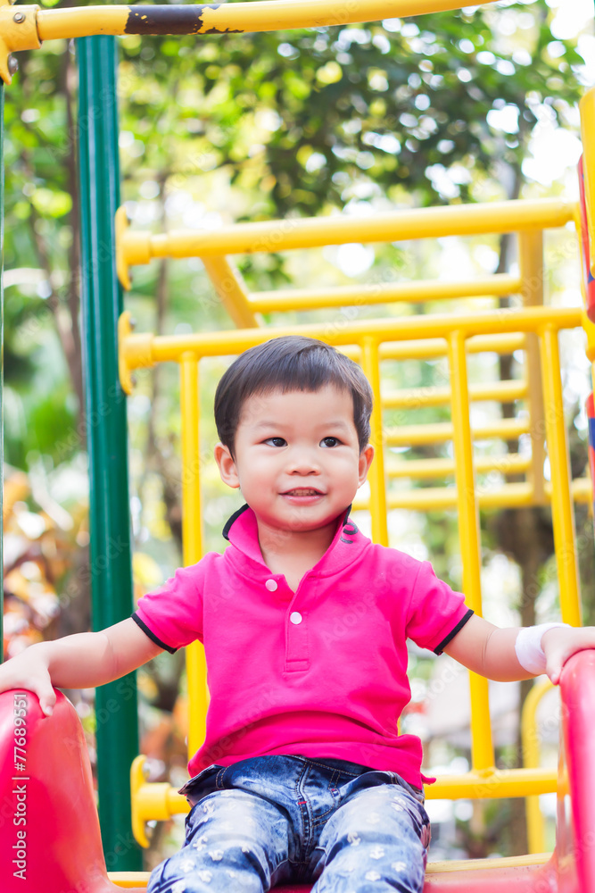 Asian boy relax in the park Asian boy relax in the park