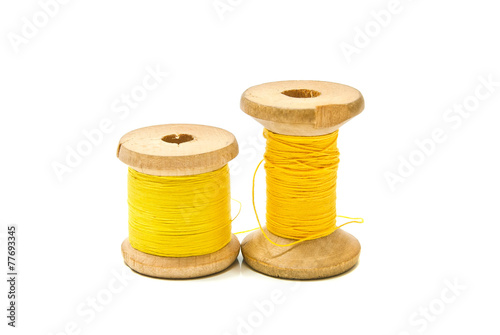Obraz na płótnie spools of yellow thread w salonie
