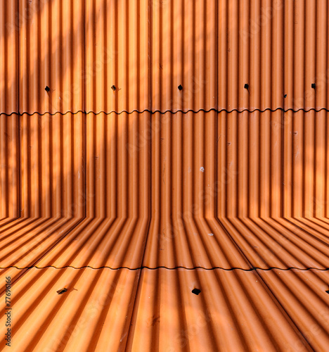 Orange metal sheet roof background