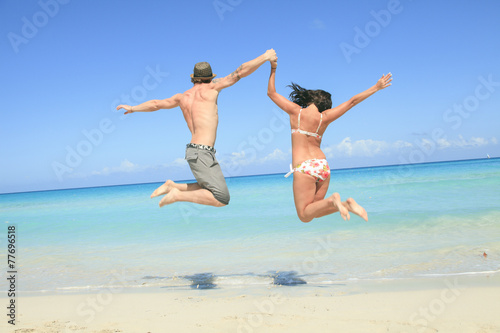 A beautiful couple on a tropical beach cuba