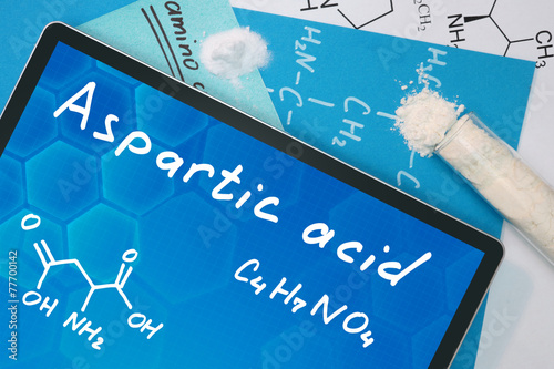Tablet with the chemical formula of Aspartic acid. Amino acids. photo