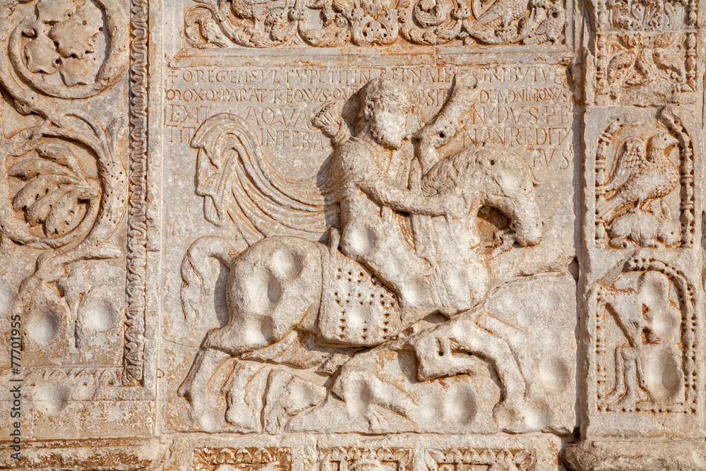 Verona - Relief of rider on facade of Basilica San Zeno.
