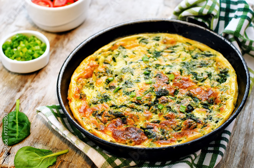 baked omelette with spinach, dill, parsley and green onions