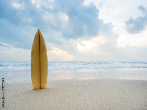 Photography Surfboard on the beach at sunset