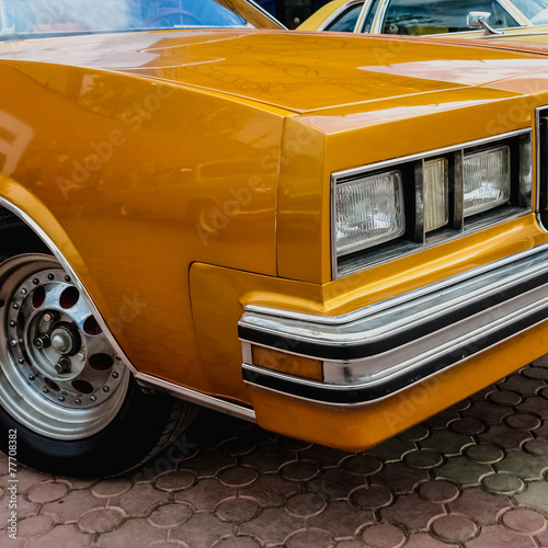 Old retro or vintage car front side