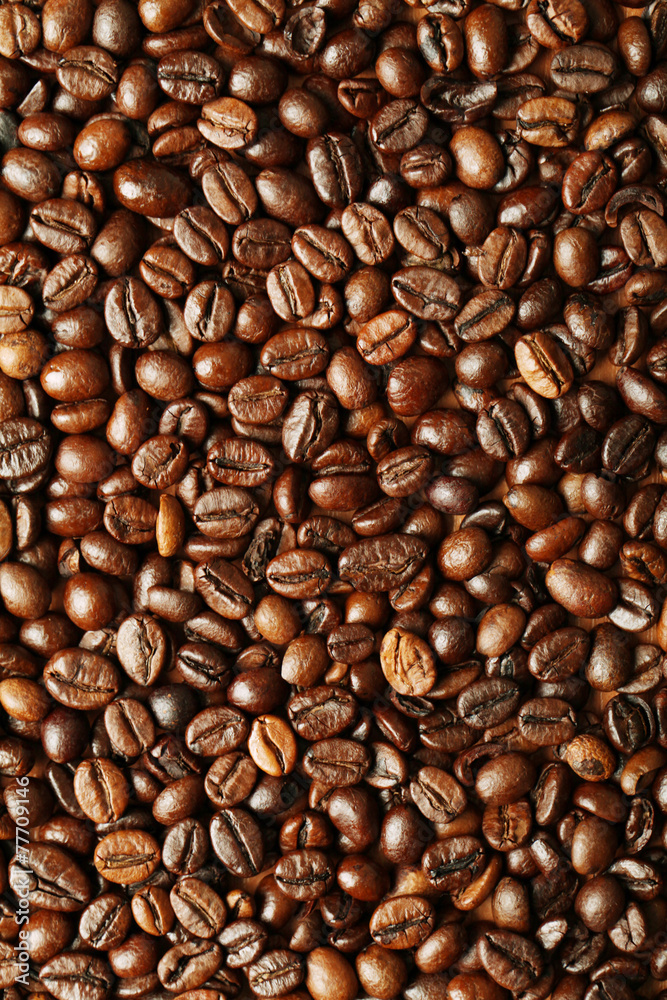 Fototapeta premium Brown coffee beans, close-up of coffee beans for background and