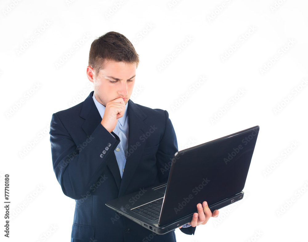 Portrait of young thinking business man with laptop in suit - is Portrait of young thinking business man with laptop in suit - is