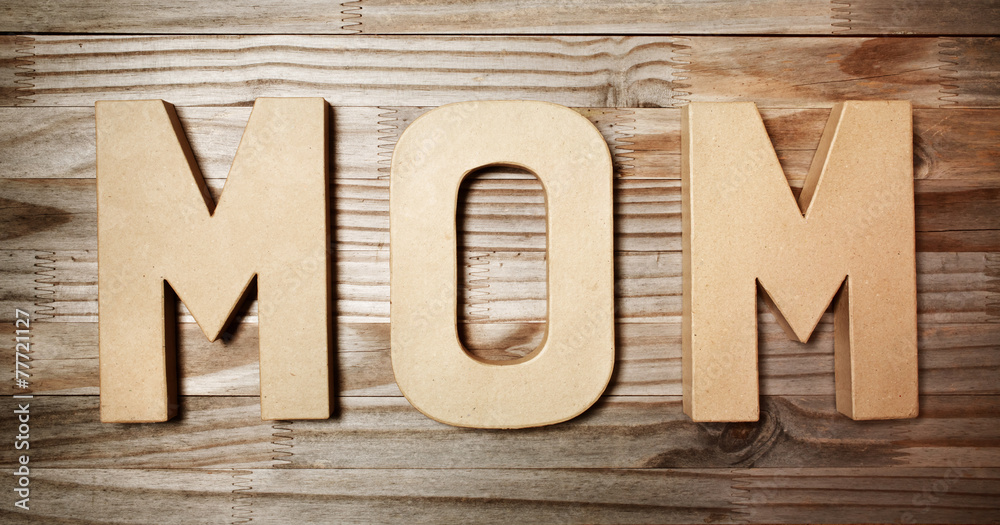 MOM text in big cardboard letters MOM text in big cardboard letters